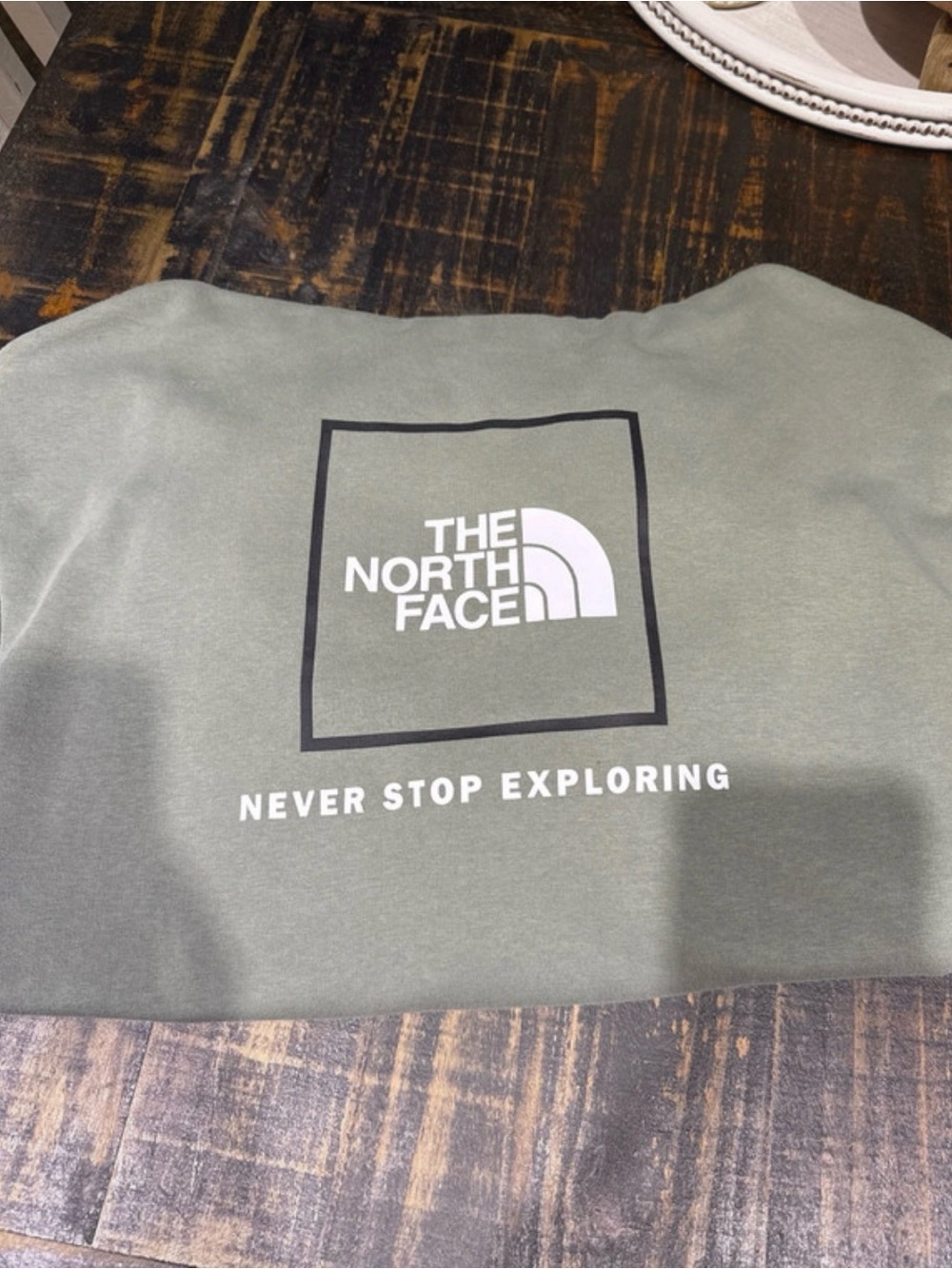 The North Face women’s Olive Green Logo Sweatshirt - Never Stop Exploring